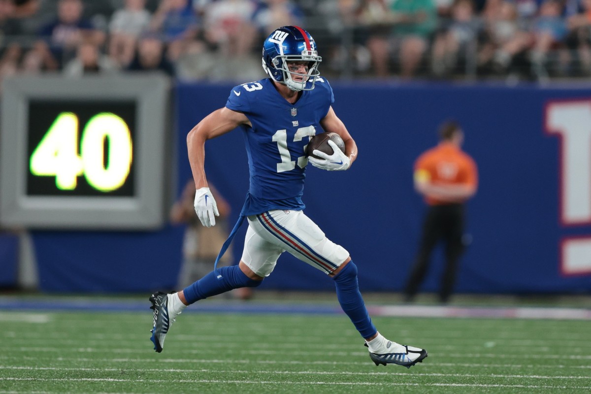 Aug 21, 2022; East Rutherford, New Jersey, USA; New York Giants wide receiver David Sills (13) gains yards after the catch during the first half against the Cincinnati Bengals at MetLife Stadium.